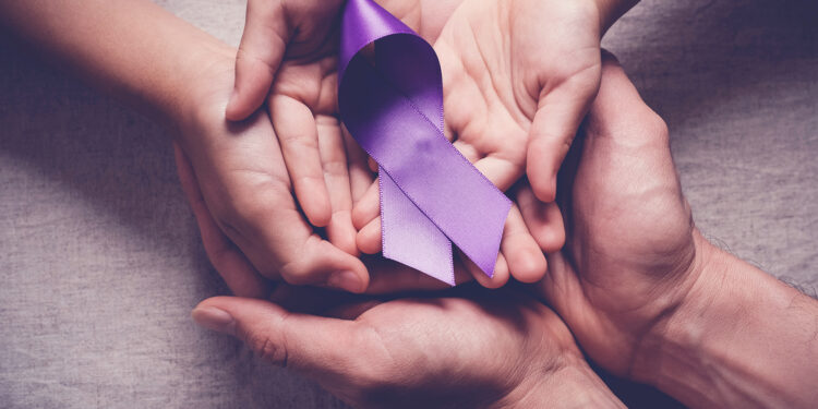 Adult and child hands holding purple ribbons, Alzheimer's disease, Pancreatic cancer, Epilepsy awareness, world cancer day