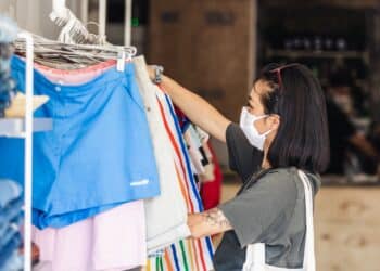 woman-shops-with-her-face-mask-in-place