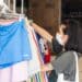 woman-shops-with-her-face-mask-in-place