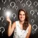 young woman holding a lightbulb with interrogation symbols