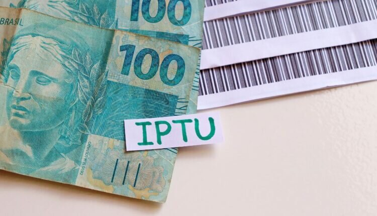 Veja quem deve pagar o IPTU 2023 - Reprodução Canva
