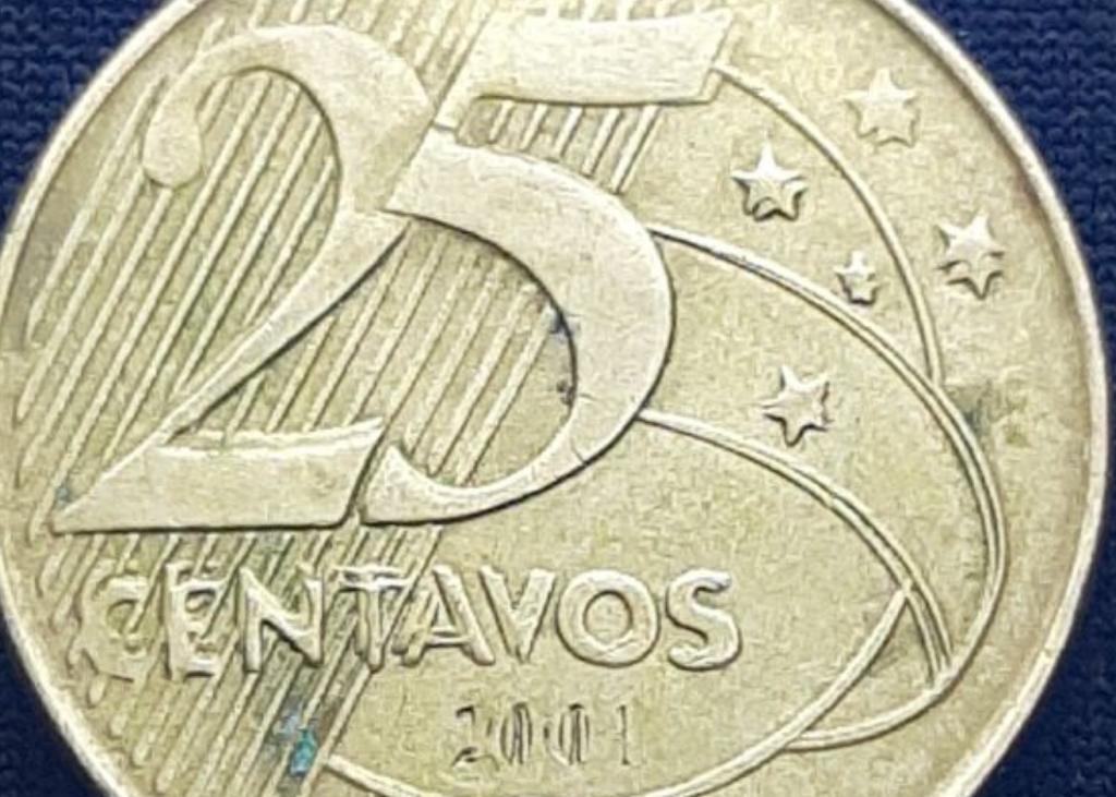 Exemplo da moeda de 25 centavos com batida dupla. Imagem: Reprodução