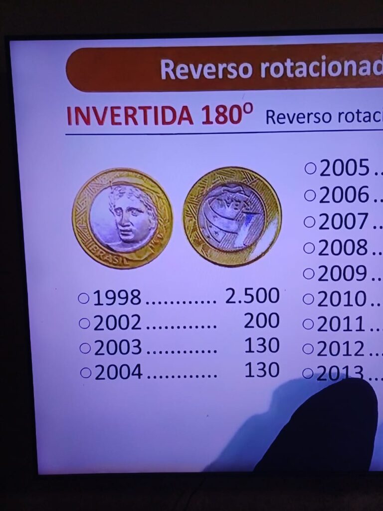 Valor das moeda de 1 real com reverso invertido