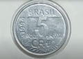 Moeda de 5 Cruzeiros Reais de 1994 com o valor "5" em destaque.