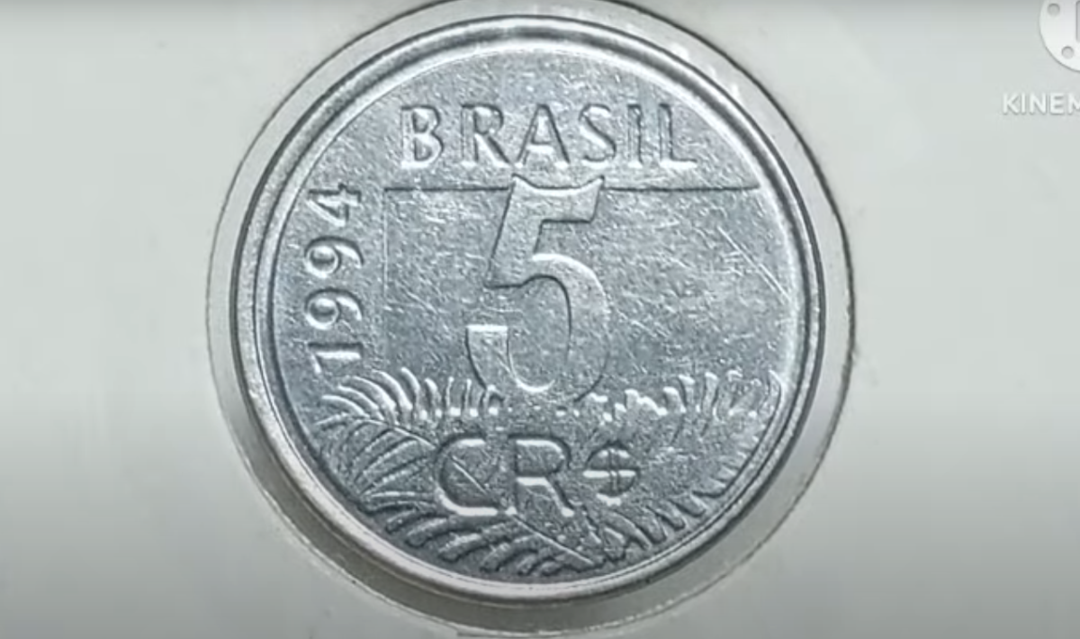 Moeda de 5 Cruzeiros Reais de 1994 com o valor "5" em destaque.