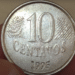 Moeda de 10 centavos de 1995, com falha de cunhagem visível, considerada rara e valiosa.