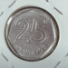 Moeda de 25 centavos com erro de cunhagem visível no design
