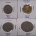 Imagem de moedas antigas de diferentes anos, como 1949, 1940, 1922 e 1901, exibidas em cartões de proteção.