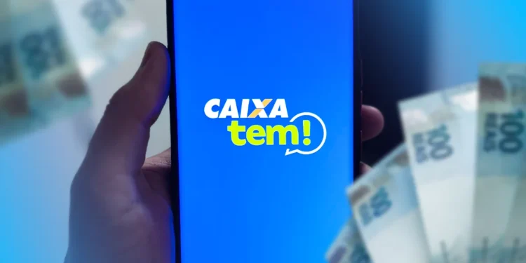 Aplicativo Caixa Tem aberto na tela do celular com notas de cem reais ao fundo.