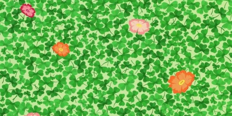 Teste visual com trevo de quatro folhas escondido entre folhas verdes e flores coloridas