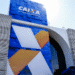 Fachada moderna da agência da Caixa Econômica Federal com arquitetura corporativa azul e laranja