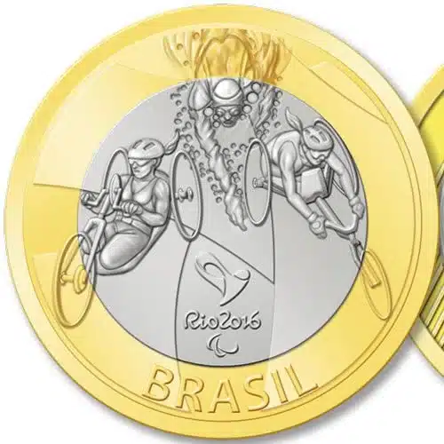 Moeda comemorativa de R$ 1 do Paratriatlo, lançada pelo Banco Central em 2014 para os Jogos Rio 2016, com o símbolo paralímpico e a palavra "Brasil".