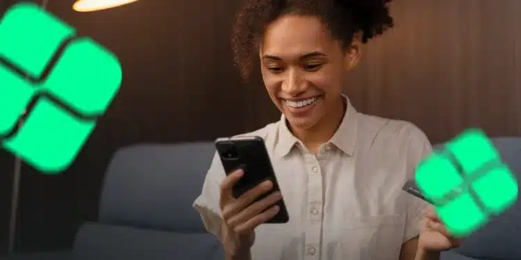 Mulher negra sorridente olhando para o celular, segurando um cartão, com a interface do Banco do Brasil e o símbolo do Pix ao fundo, ilustrando a agilidade do novo método de pagamento por foto via WhatsApp.