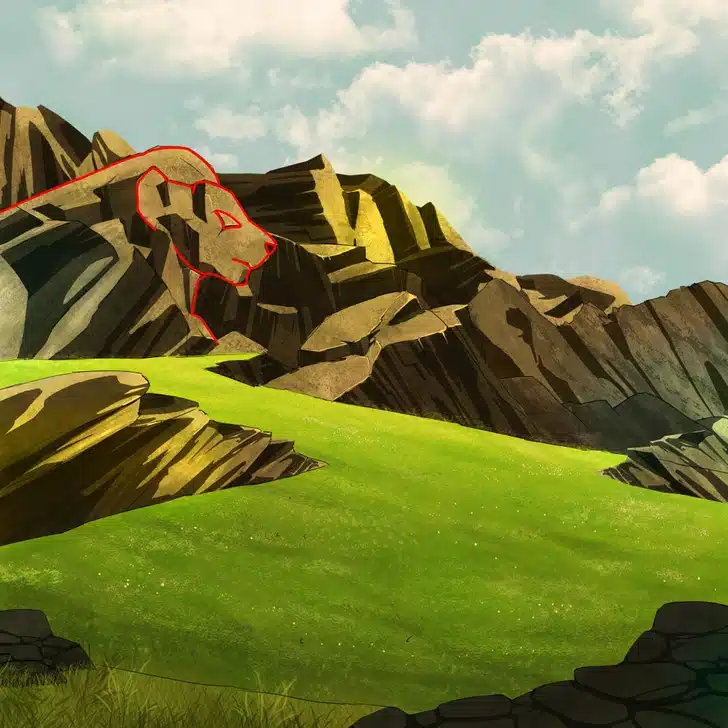 Encontre o leão nas montanhas rochosas com gramado verde sob céu azul Ilusão de ótica com montanhas rochosas ao fundo com gramado verde e céu azul com algumas nuvens brancas.