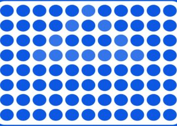 Ilusão de ótica com uma grade azul clara e círculos azuis em tons variados, com variação na cor central