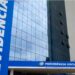 Sede do INSS com a inscrição 'Previdência Social' visível na fachada do edifício.
