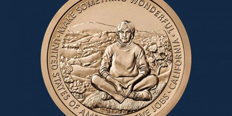 Moeda comemorativa ou medalha com o retrato de Steve Jobs em meditação e a inscrição "STEVE JOBS - CALIFORNIA", representando a homenagem póstuma que o transformou em rosto de uma moeda americana.