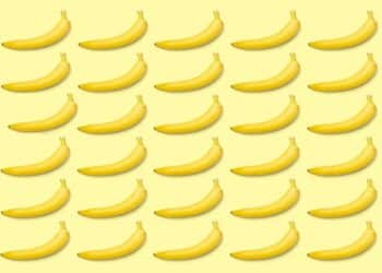 Teste visual mostrando várias bananas amarelas alinhadas em um padrão sobre fundo amarelo claro.