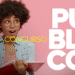 Jovem mulher com cabelo cacheado, óculos e expressão de surpresa, segurando lápis amarelo e livro vermelho aberto, em fundo rosa com texto "Concurso Público".