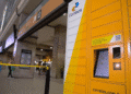 Locker automático amarelo dos Correios em agência durante implementação do PDV que pode desligar dez mil funcionários