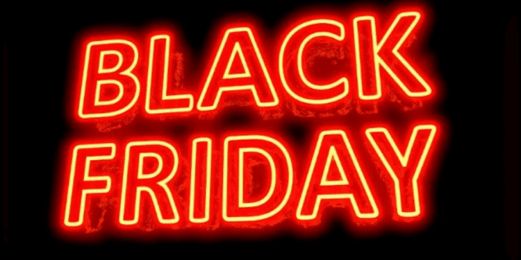 Letreiro em neon vermelho com as palavras “Black Friday” sobre fundo preto.