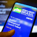 Tela de celular mostrando o aplicativo oficial do Auxílio Emergencial do Governo Federal do Brasil da Caixa