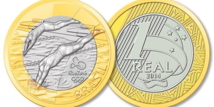 Imagem clara da frente e do verso da moeda de 1 Real da Natação (Rio 2016), com o atleta em mergulho e a data 2014, usada para discutir seu valor no mercado numismático.