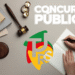 Mesa com martelo de juiz, cadernos, mãos escrevendo e logotipo do TJ-RS, representando concurso público.