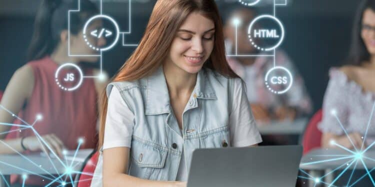 Jovem estudando programação em laptop cercada por ícones de linguagens como HTML CSS PHP e JavaScript.