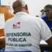 Defensor Público em atendimento representando vagas jurídicas abertas em 2026.