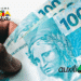 Imagem destacando os pagamentos do Bolsa Família e Auxílio Gás, com notas de 100 reais e logotipo dos programas de auxílio.