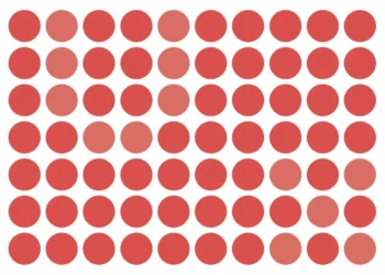 Desafio visual com círculos vermelhos onde letras U e X estão camufladas em tons mais claros no centro da imagem.