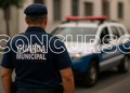 Guarda municipal fardado próximo a viatura aguardando novos concursos na região Sul.