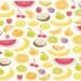 Desafio visual com diversas frutas coloridas como banana, melancia, laranja, kiwi, coco e cereja