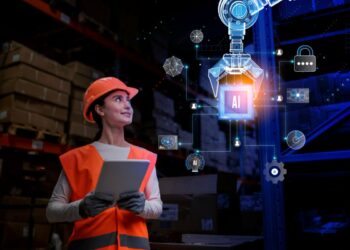 Profissional utilizando inteligência artificial para otimizar processos na indústria, com foco em automação e dados.