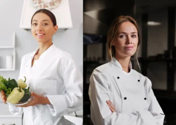 Nutricionista com ingredientes frescos na cozinha, representando a Nutrição e Chef profissional, representando a Gastronomia.