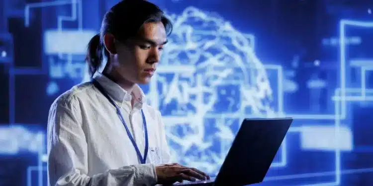 Profissional de tecnologia trabalhando com inteligência artificial no mercado de trabalho.