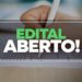 Texto "Edital Aberto" sobre formulário sendo preenchido à mão, representando concurso com vagas para Psicólogo, Dentista e Agente de Defesa Civil com inscrições abertas até 26 de fevereiro.