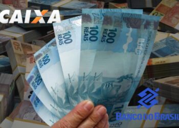 Notas de 100 reais em destaque, com logotipos da Caixa Econômica Federal e Banco do Brasil, relacionadas ao Pix liberado em fevereiro.