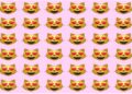 Teste visual com vários emojis de gato sorrindo com olhos em forma de coração alinhados em fundo rosa