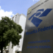Placa da Superintendência da Receita Federal com logotipo do Ministério da Fazenda representando alerta a empresas e MEIs endividados