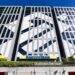 Fachada do Banco do Brasil com o logotipo visível, representando a instituição financeira que oferece a antecipação da restituição do Imposto de Renda aos seus clientes.