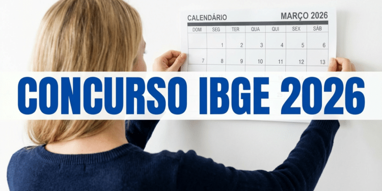 Pessoa de costas pendura calendário de março de 2026 na parede
