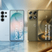 Dois celulares, Samsung Galaxy S26 Ultra branco e Motorola Signature dourado, exibidos em superfície de mármore