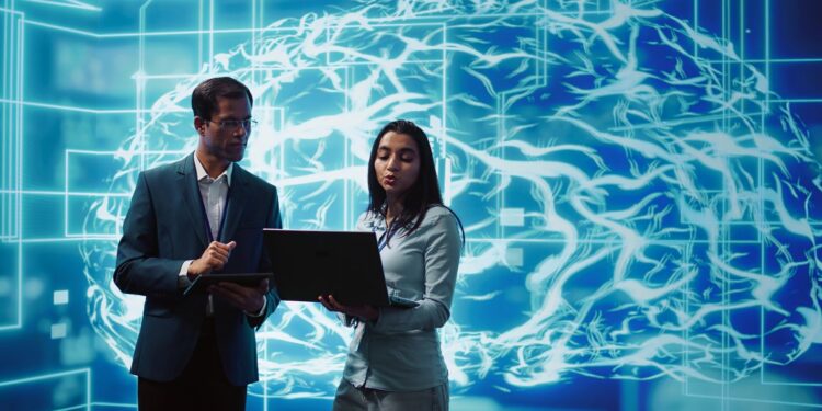 Profissionais de tecnologia analisando sistema de inteligência artificial em ambiente digital com visualização de rede neural.