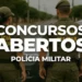 Policiais militares ao lado de viatura ilustrando concursos públicos com vagas abertas no Brasil.