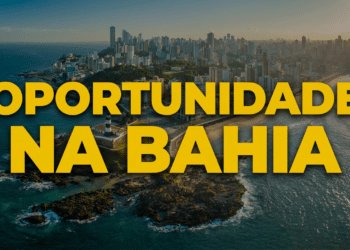 Vista aérea do Farol da Barra com skyline de Salvador ao fundo e texto amarelo "Oportunidade na Bahia"