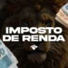 Leão cercado por notas de R$100,00 e nome "Imposto de Renda" destacado.