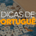 Peças de letras de madeira espalhadas sobre a mesa, em referência às dicas de português sobre o uso de X e CH.
