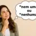 Mulher adulta pensativa olhando para balão de pensamento, representando a dúvida entre “nem uma” e “nenhuma” na língua portuguesa.